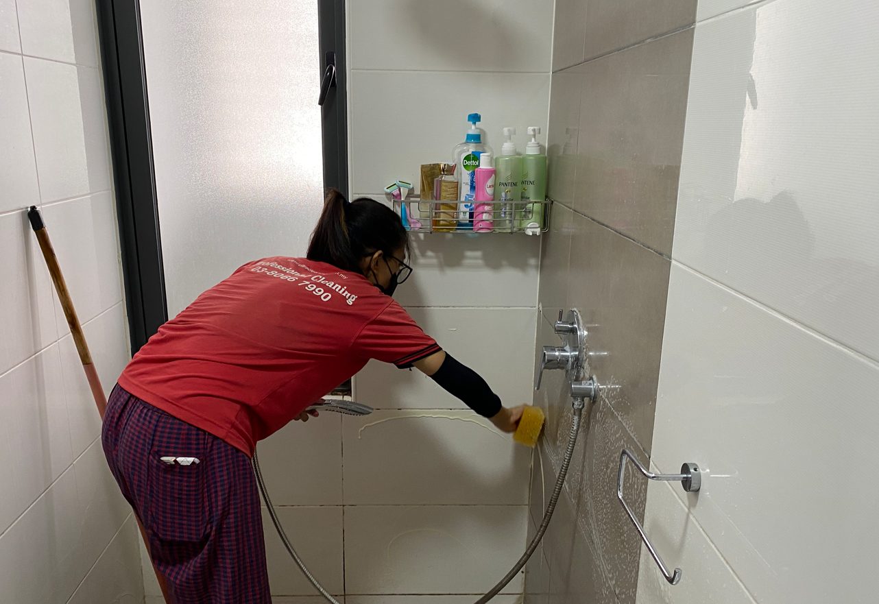 Ultra Cleaning specialist deep-cleaning a bathroom in Bangsar